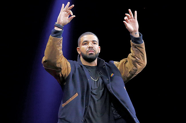 Musician Drake gestures during the Apple Worldwide Developers Conference in San Francisco, Monday, June 8, 2015. The maker of iPods and iPhones introduced Apple Music, its new streaming-music service. (AP Photo/Jeff Chiu)